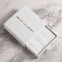 Thumbnail for Stylish packaging for the Birth Flower Name Necklace by Brother & Sisters, showcasing elegant design.