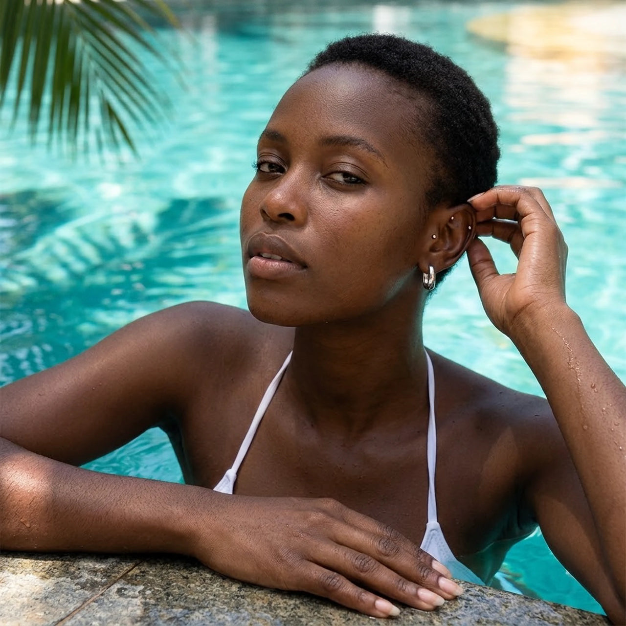 Chunky Dome Hoops in Silver, worn by a tropical pool | SKU: 41005-silver