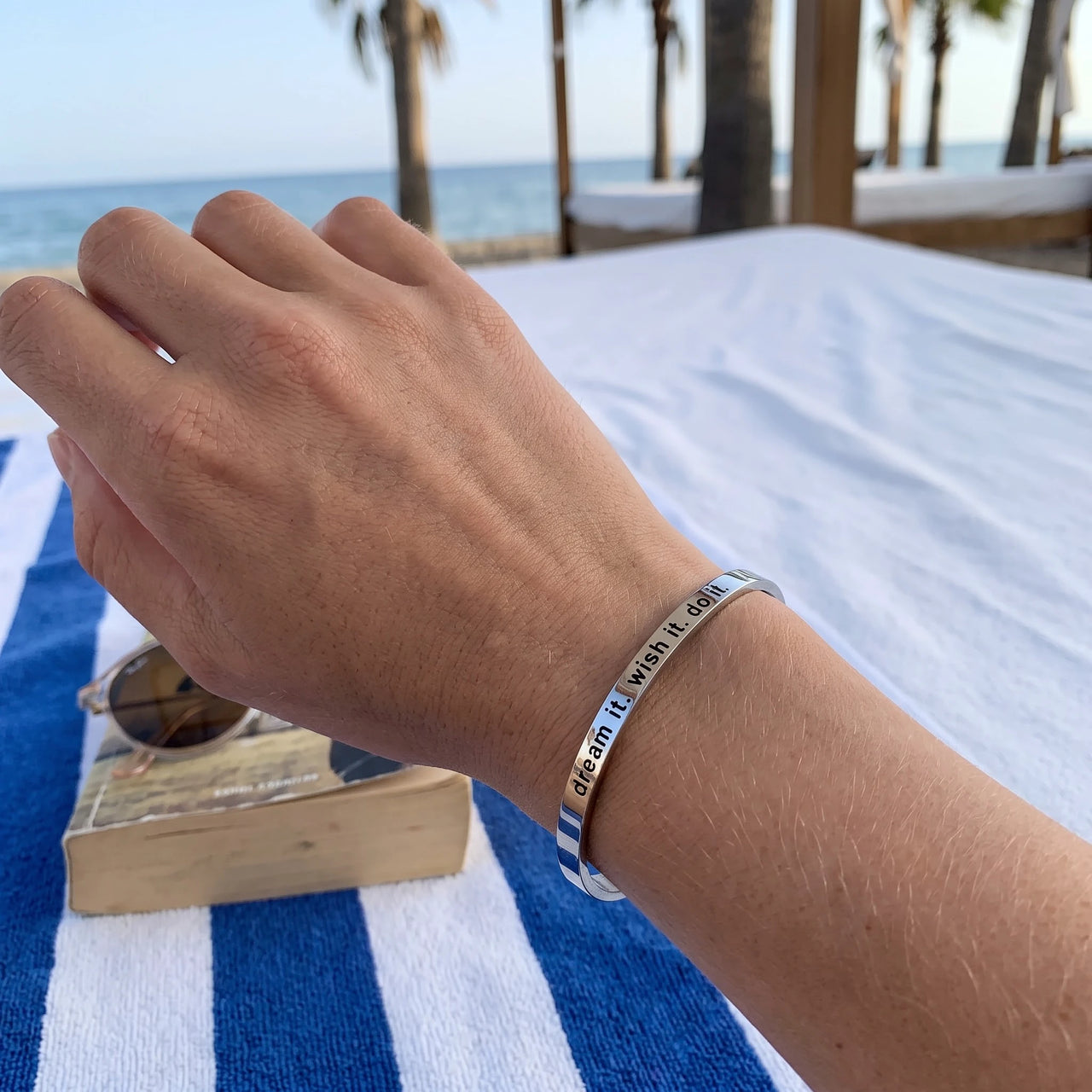 Silver engraved cuff bracelet worn, showing its real size | SKU: 4214557-silver-plated