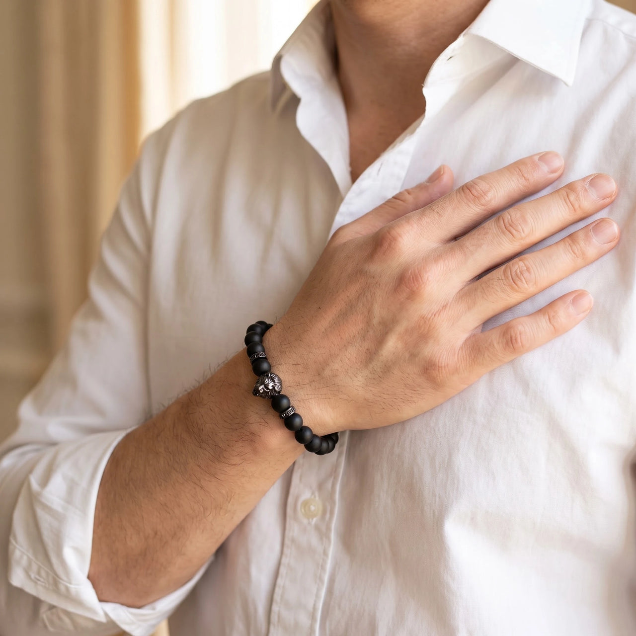 Black Lion & Black Stones Bracelet – close-up worn on a man's wrist | Brother & Sisters | SKU: 20712286-gun-black-XS-14-15, 20712286-gun-black-S-16-17, 20712286-gun-black-M-18-19, 20712286-gun-black-L-20-21, 20712286-gun-black-XL-22-23