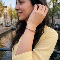 Thumbnail for Red rope bracelet — worn, everyday gesture, rose gold | SKU: lamour-rg