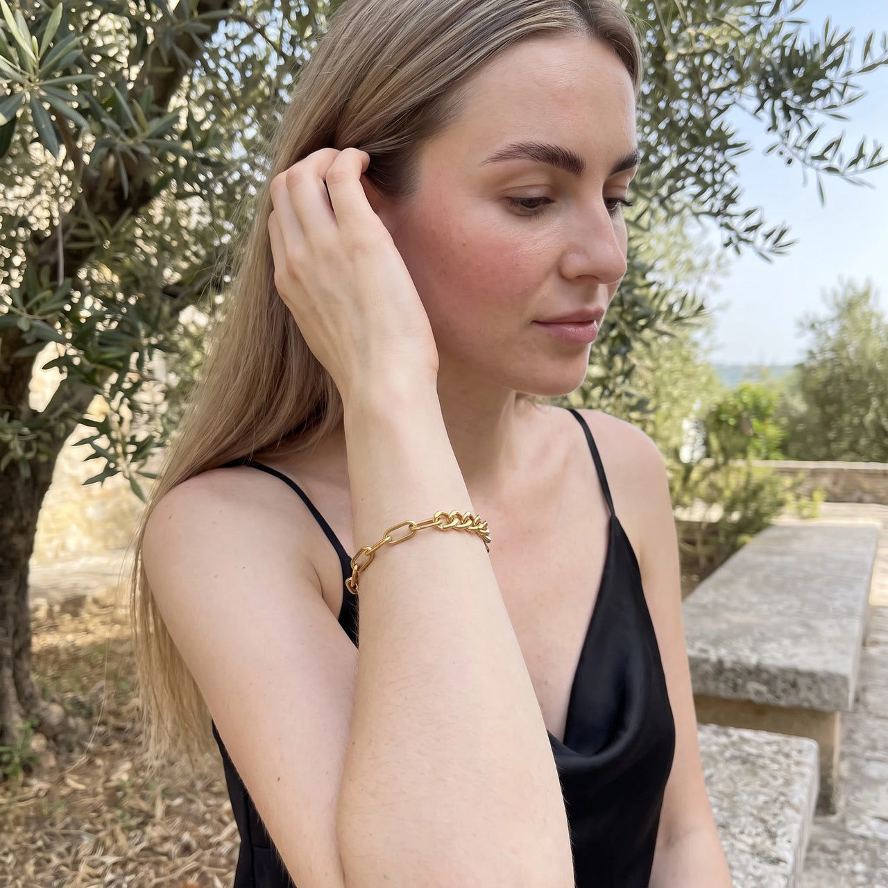 Gold chain bracelet — worn, everyday gesture, gold | SKU: ledouble