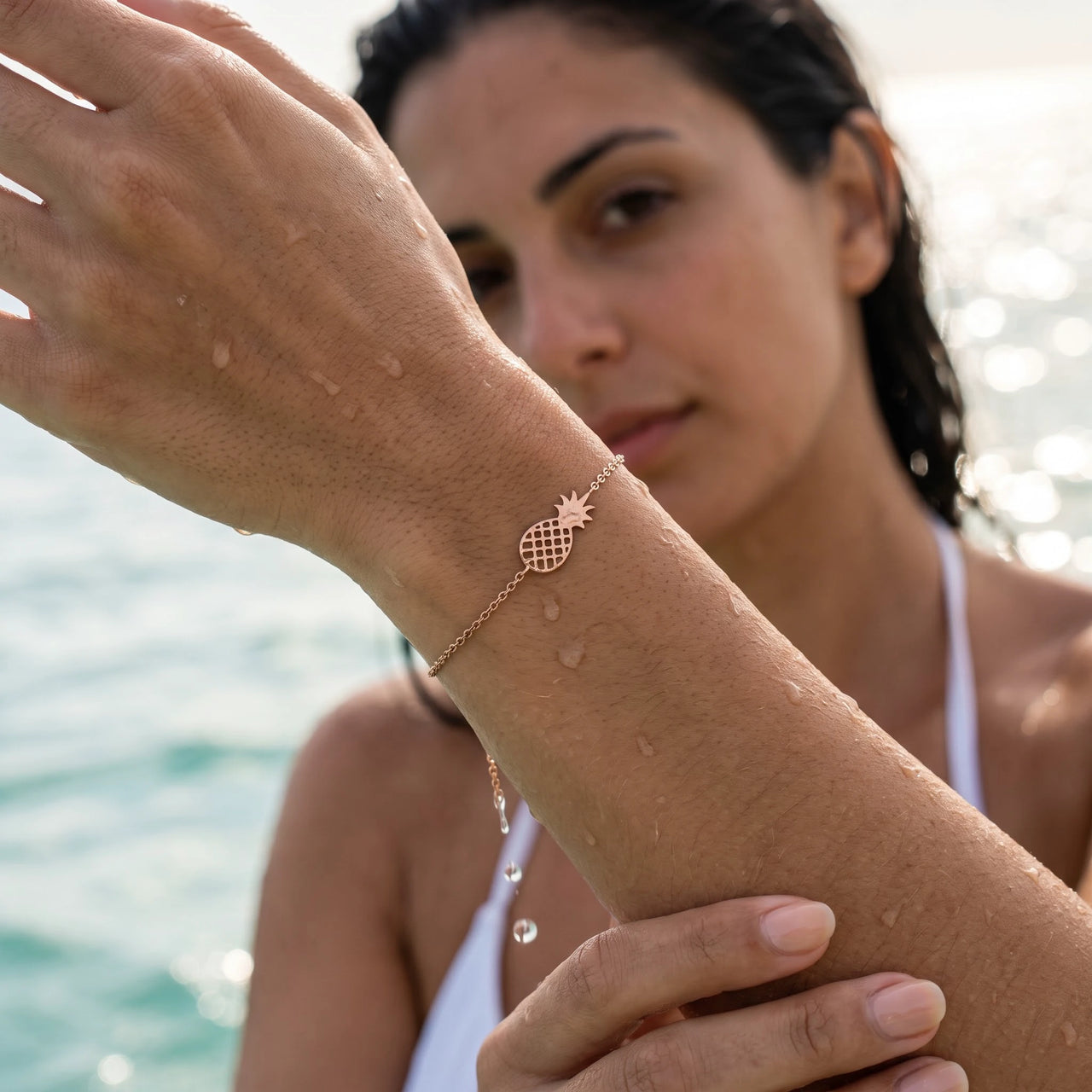Rose gold charm bracelet worn in the sea, waterproof stainless steel with water drops | SKU: 9178613-rose-gold