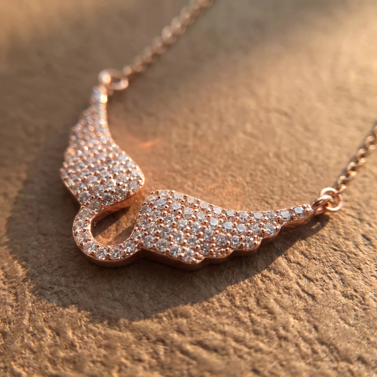 Close-up of the rose gold necklace | SKU: 42002-rose-gold