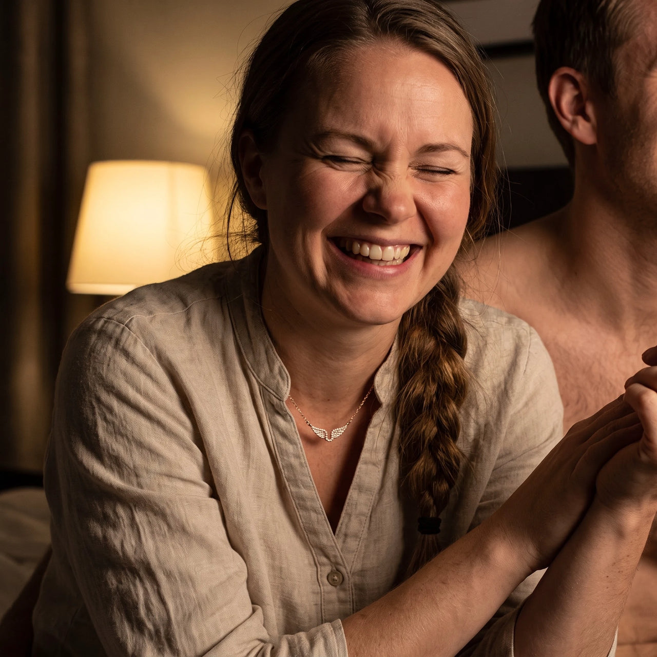 Woman laughing, wearing the rose gold necklace | SKU: 42002-rose-gold