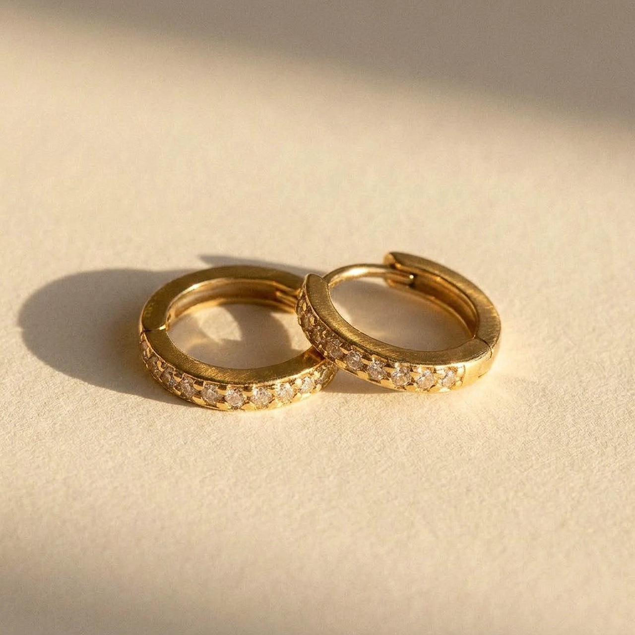 Pave Huggie Hoop Earrings in Gold, product photo | SKU: 41011-gold