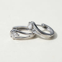 Thumbnail for Pear Crystal Huggie Hoops in Silver, product photo | SKU: 41007-silver