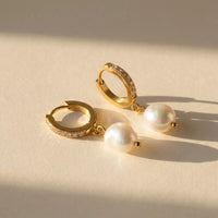Thumbnail for Pearl Drop Huggie Hoops in Gold, product photo | SKU: 41003-gold