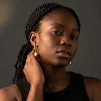 Thumbnail for Pearl Drop Huggie Hoops in Gold, studio portrait | SKU: 41003-gold