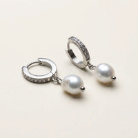 Thumbnail for Pearl Drop Huggie Hoops in Silver, product photo | SKU: 41003-silver