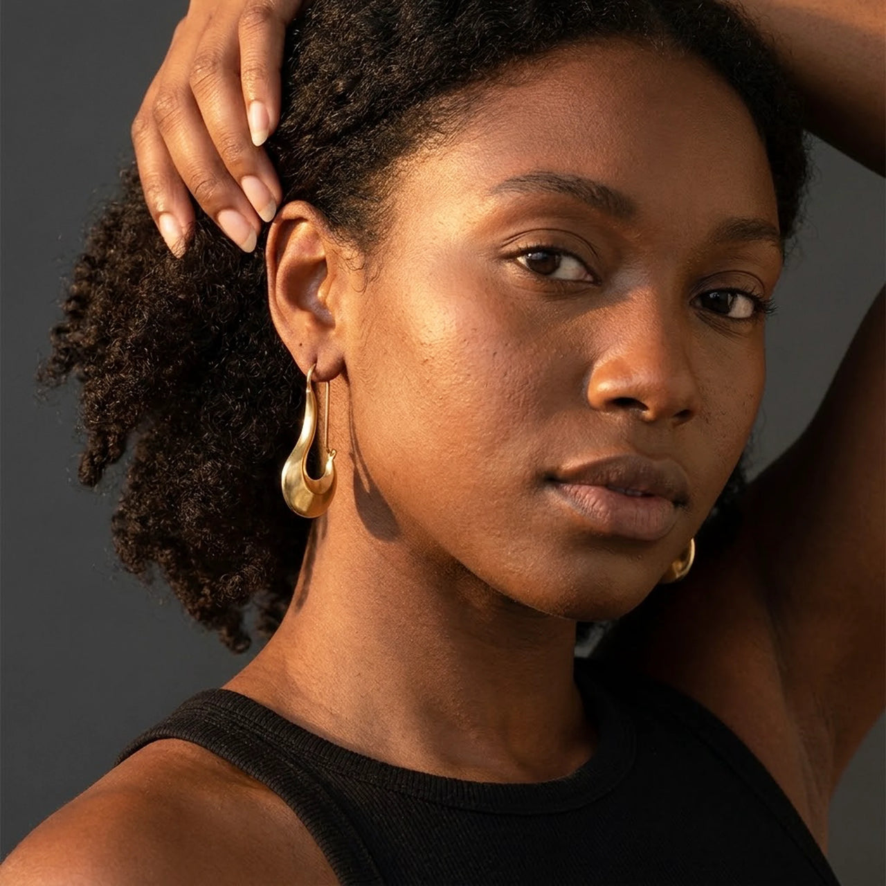 Sculpted Crescent Drops in Gold, studio portrait | SKU: 41008-gold