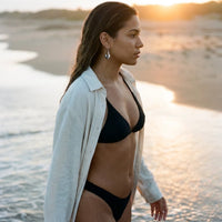 Thumbnail for Sculpted Crescent Drops in Silver, worn on the beach | SKU: 41008-silver