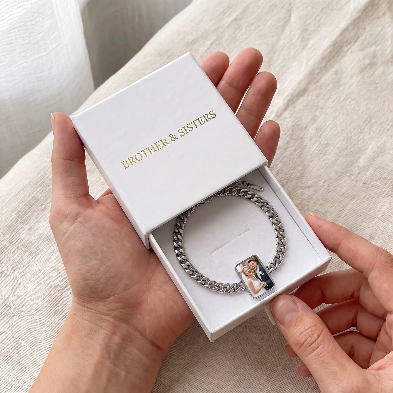 The silver cushion-cut photo bracelet with a wedding photo, in the open Brother & Sisters gift box | SKU: TPH-CUSB-SILVER