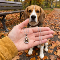 Thumbnail for Customer photo: the silver drop photo necklace with her dog's photo, her beagle in the background | SKU: TPH-DRPN-SILVER