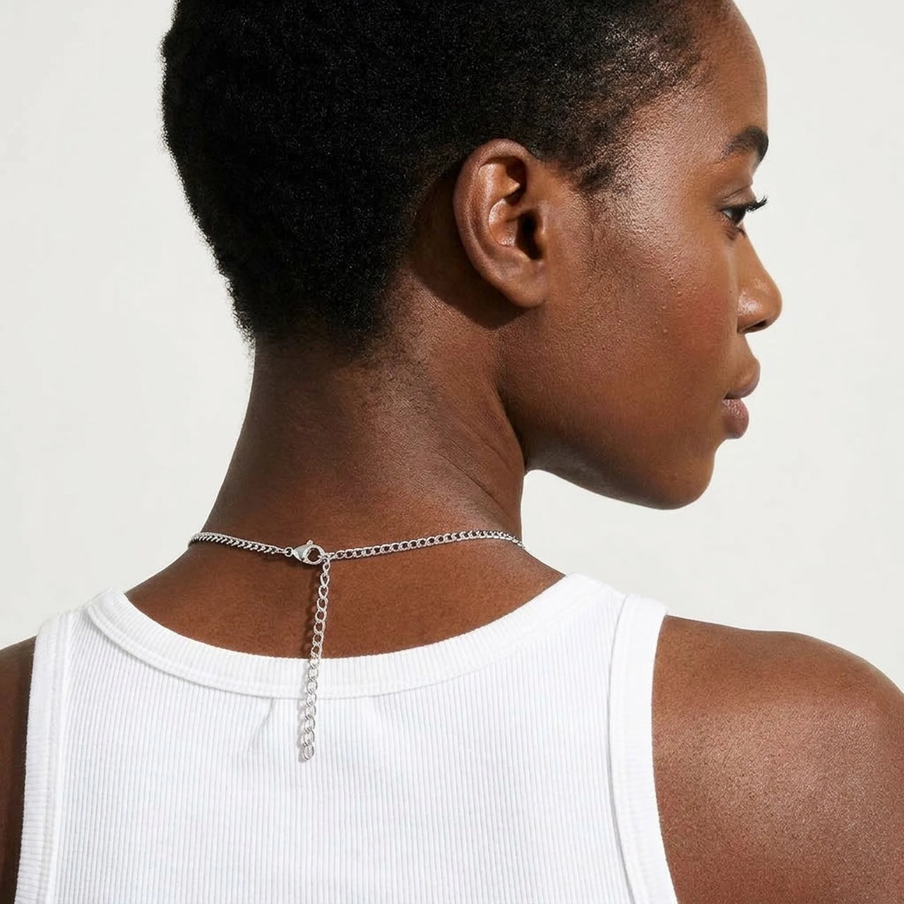 Back of the neck showing the lobster clasp and extension chain of the silver photo necklace | SKU: TPH-HRTN-SILVER