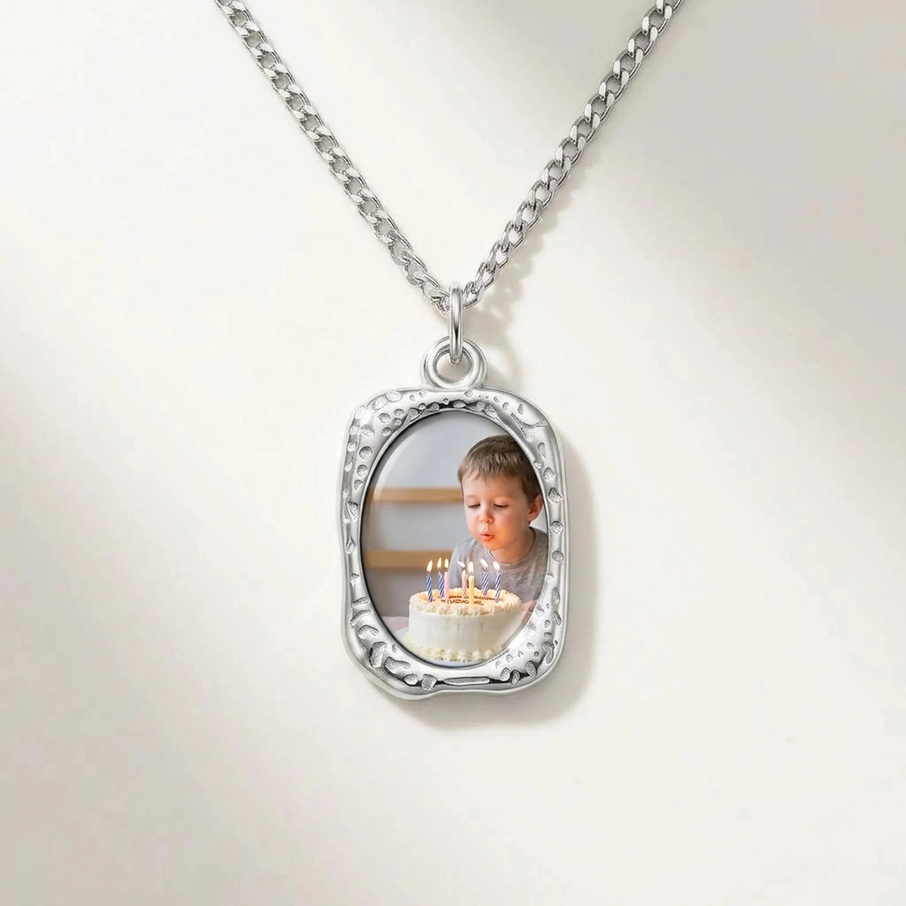 Secret Oval Photo Necklace in silver, black oval pendant turning into a hidden photo when warmed | SKU: TPH-OVLN-SILVER