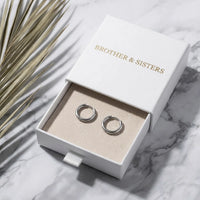 Thumbnail for Tiny Huggie Hoops in Silver, in the gift box | SKU: 41002-silver