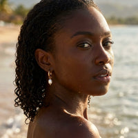 Thumbnail for Twisted Pearl Drop Hoops in Gold, worn in the sea, wet skin | SKU: 41004-gold